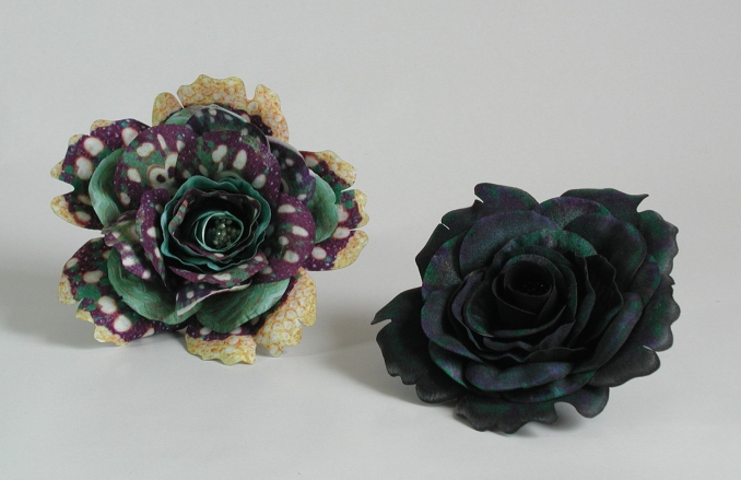 Sapphire (left) and Swallowtail Butterfly (right) Corsage Corsage created from the image of a sapphire shown left and swallowtail butterfly shown right